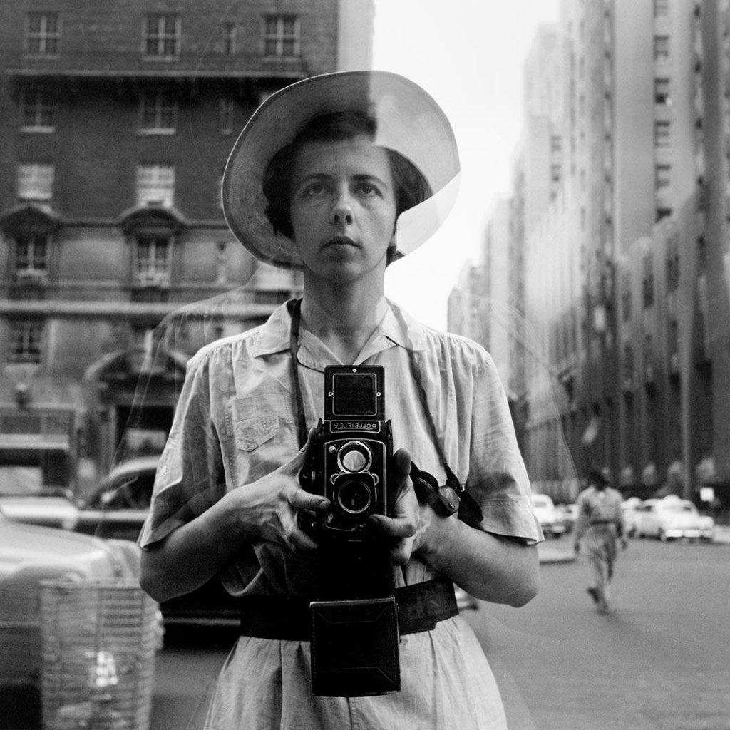 A photo of Vivian Maier, a famous female american photographer.