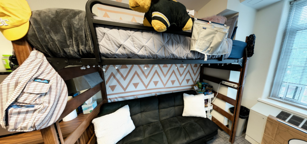 A slideshow carousel of different views of a Towers' dorm room setup.
