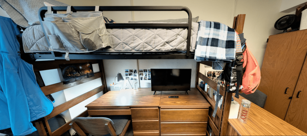 A slideshow carousel of different views of a Towers' dorm room setup.