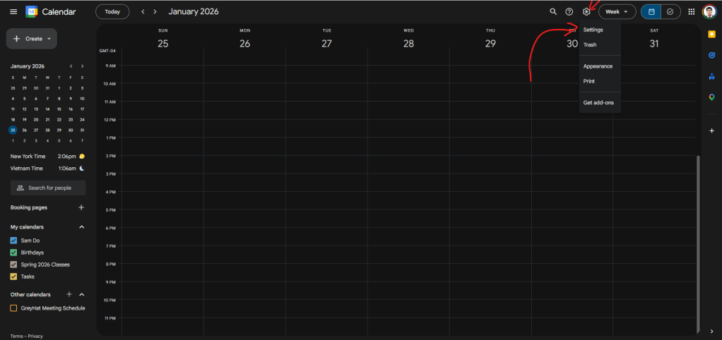A screenshot of the Google Calendar interface in dark mode. A red hand-drawn arrow points from the center right towards a gear icon in the top right corner, indicating the "Settings" menu option in the dropdown.